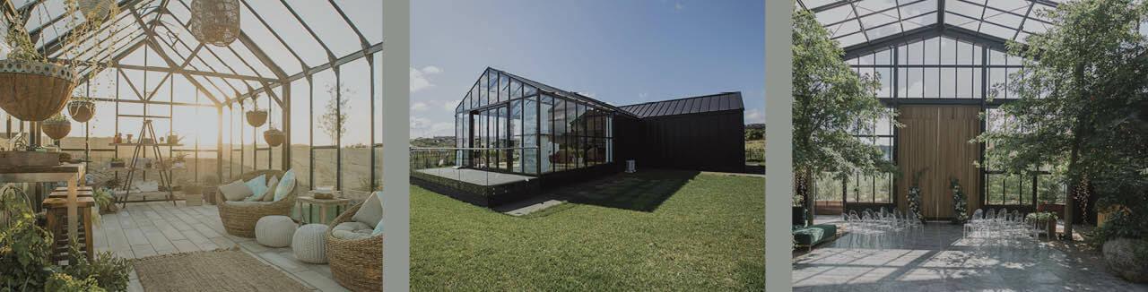 Modern glass greenhouse with stylish interior seating, outdoor lawn, and indoor plants in architectural winter garden