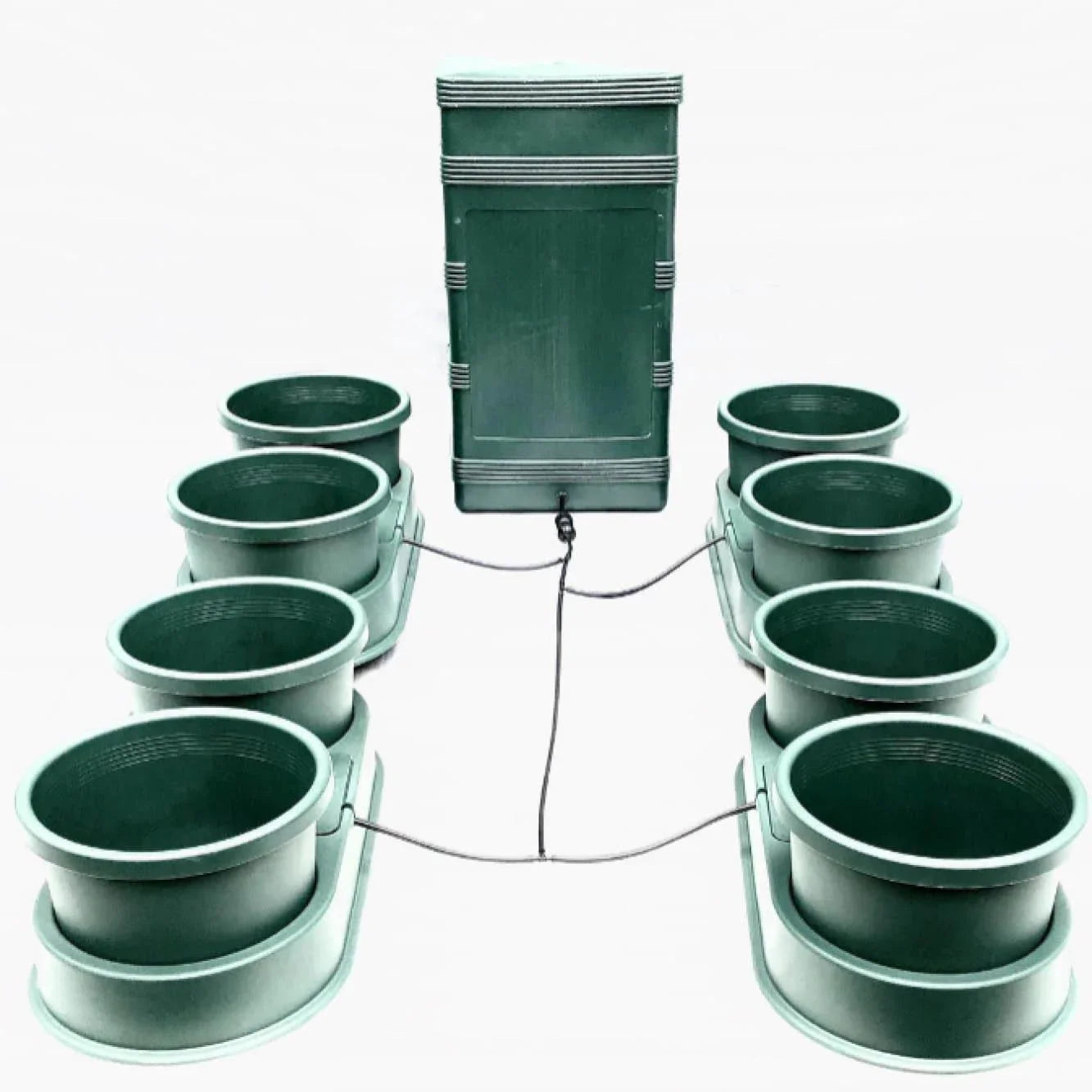 Green plastic irrigation system with eight connected plant pots and central control box